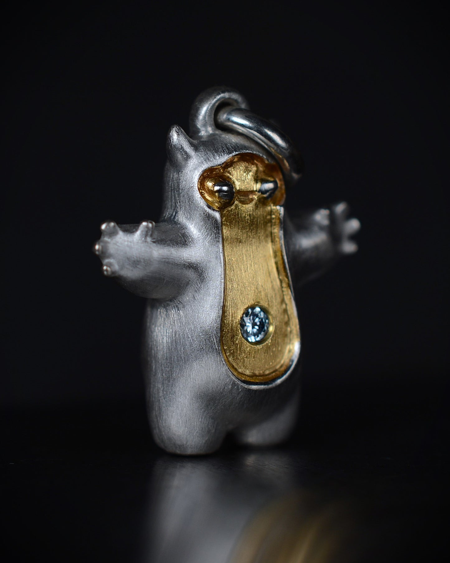 Pearshape Bright Creature Companion Being with a diamond and parcel gilt.