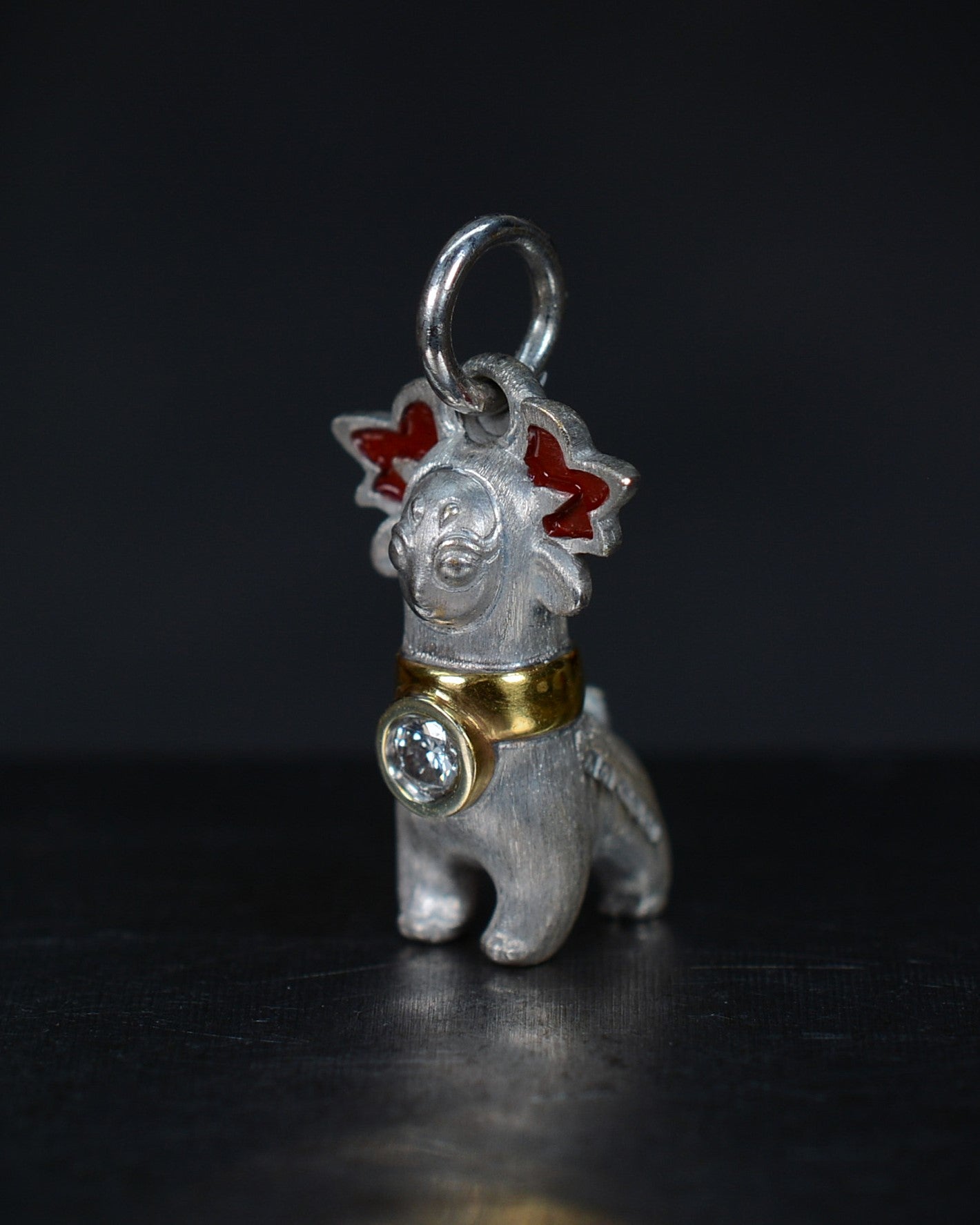 Bright Creature with red antlers and a diamond and parcel gilt collar.