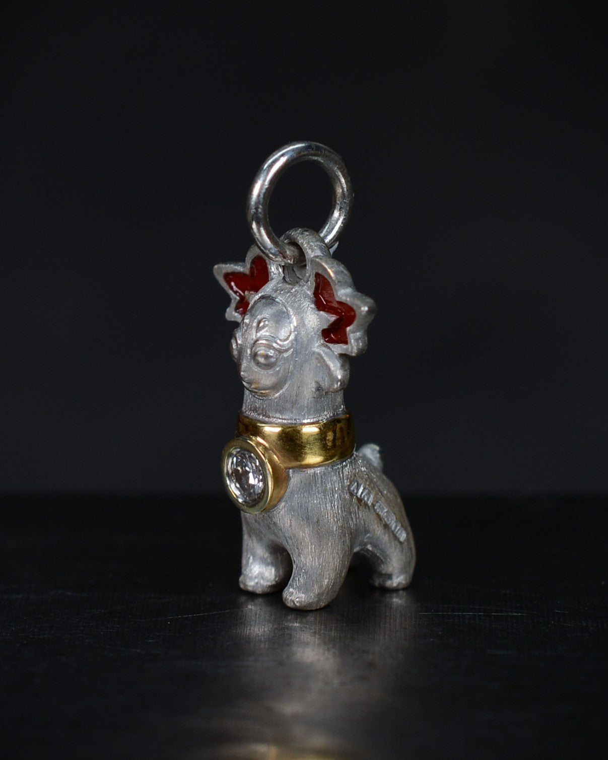 Bright Creature with red antlers and a diamond and parcel gilt collar.
