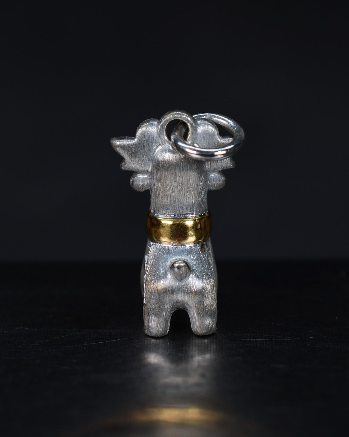 Bright Creature with red antlers and a diamond and parcel gilt collar.