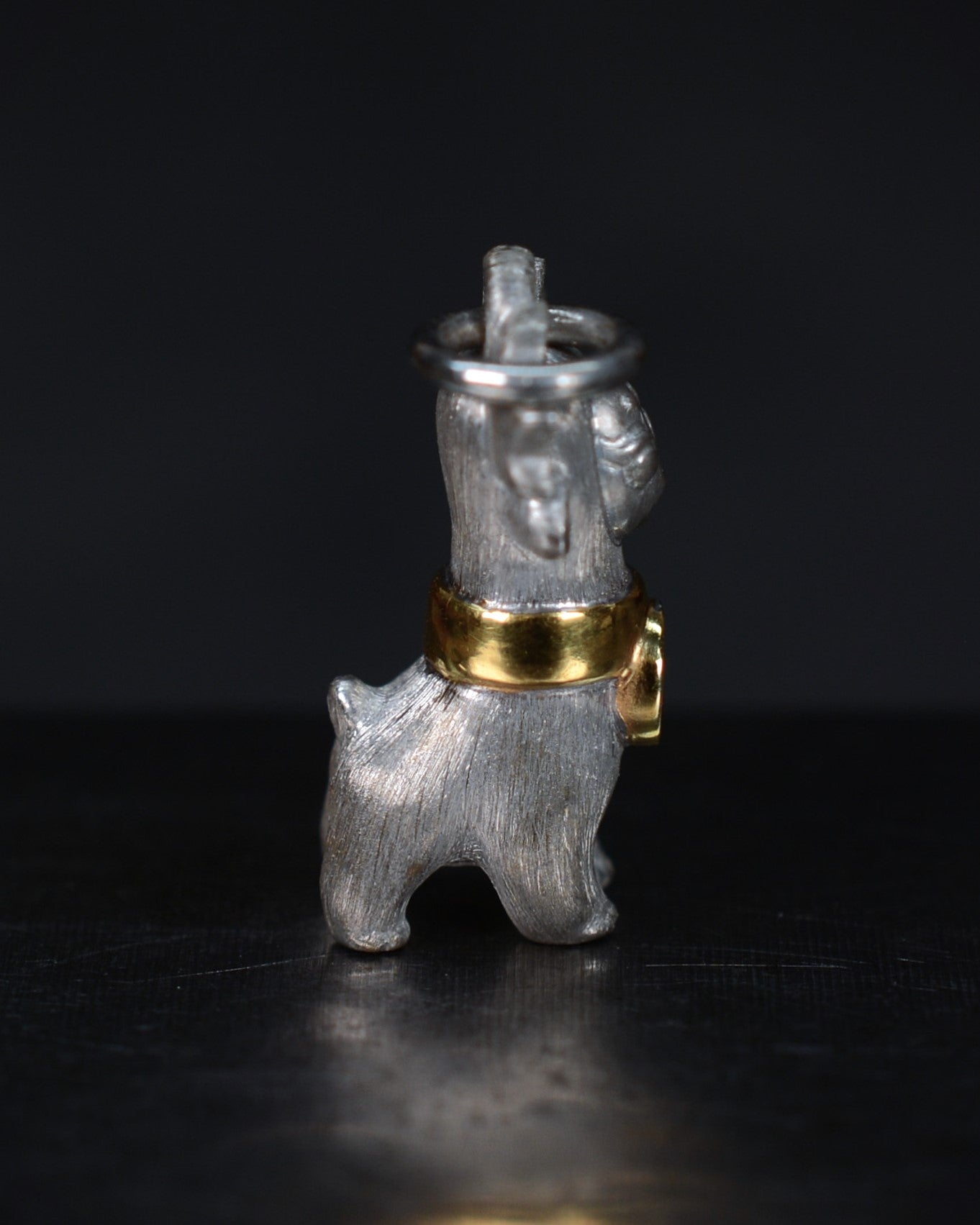 Bright Creature with red antlers and a diamond and parcel gilt collar.