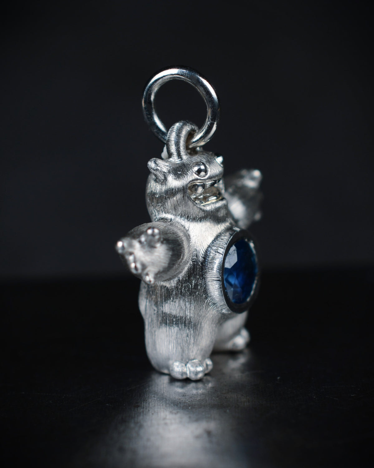 Happy chubby Bright Creature with a natural sapphire belly.