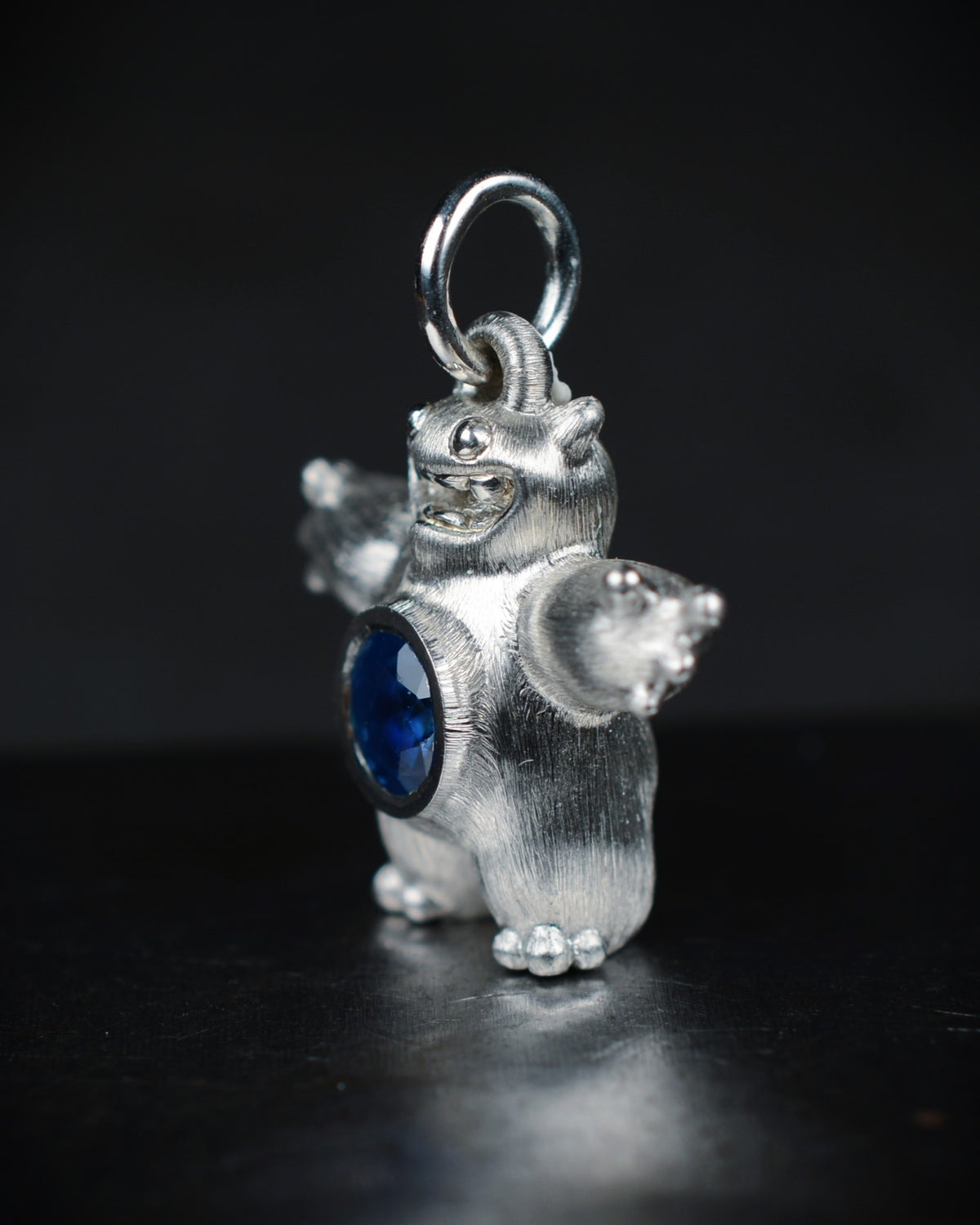 Happy chubby Bright Creature with a natural sapphire belly.
