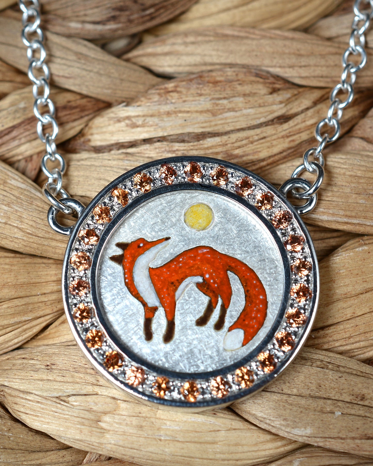 Orange Sapphire and enamel fox pendant and chain.