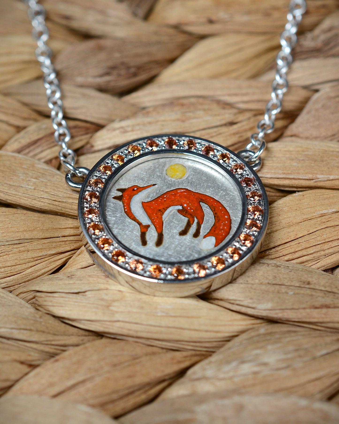 Orange Sapphire and enamel fox pendant and chain.