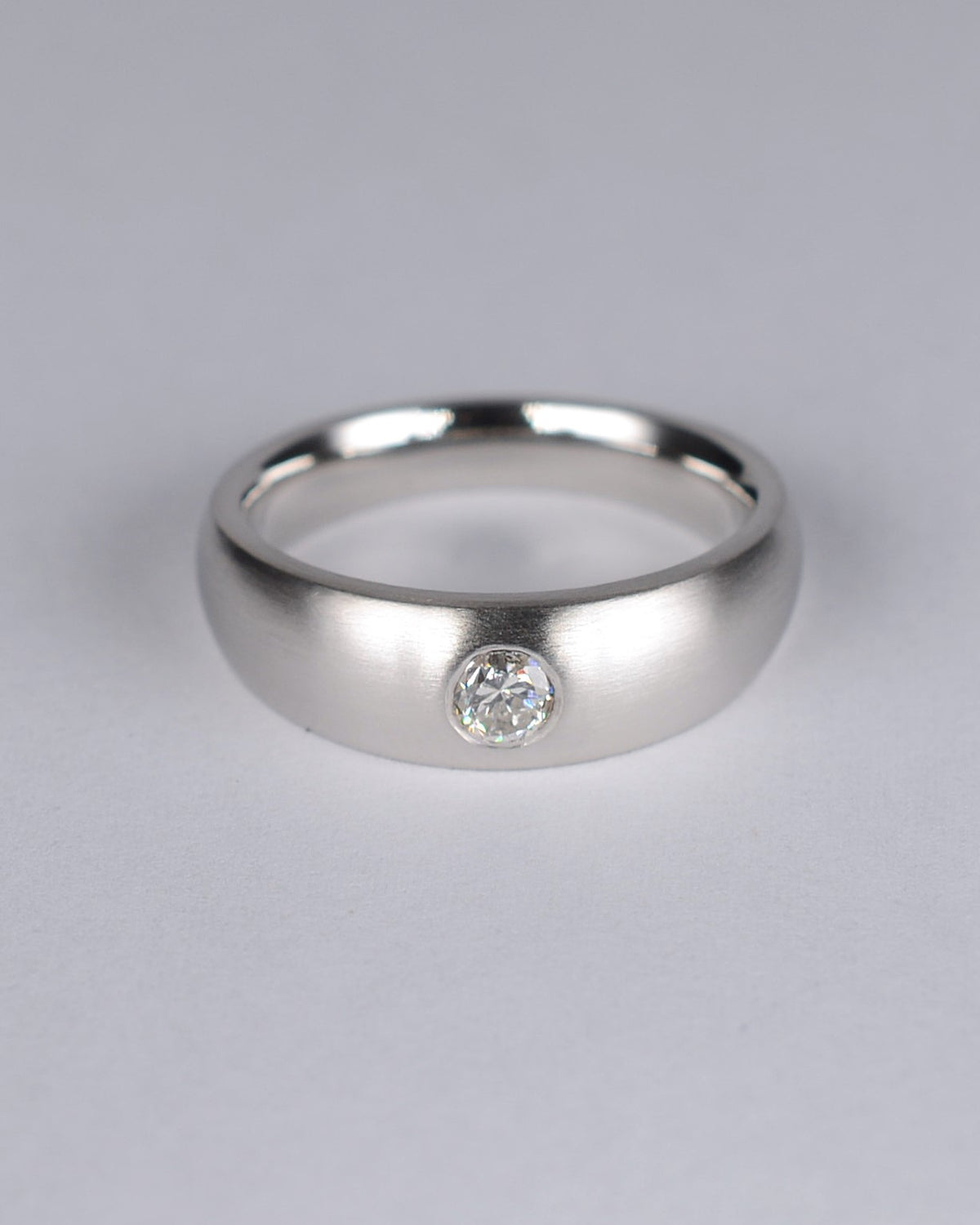 Transitional-cut diamond ring featuring a 0.24ct natural diamond reclaimed from vintage jewellery.
