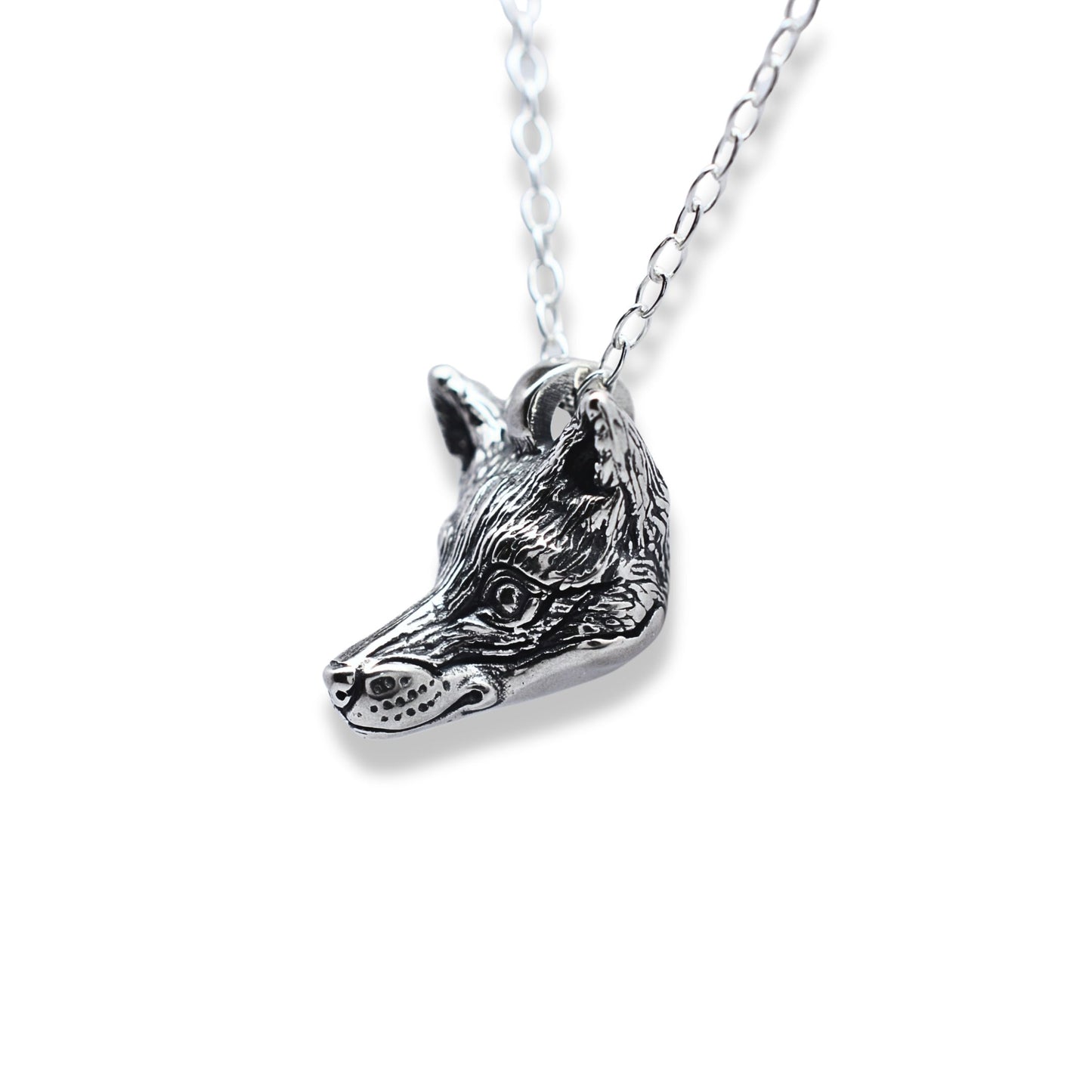 Solid sterling silver fox pendant and chain. © Adrian Ashley