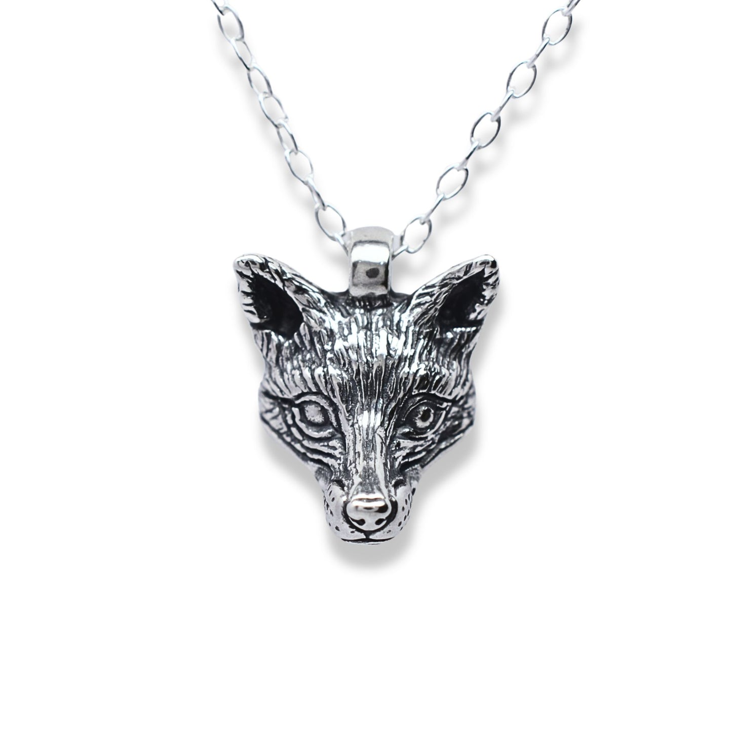 Solid sterling silver fox pendant and chain. © Adrian Ashley