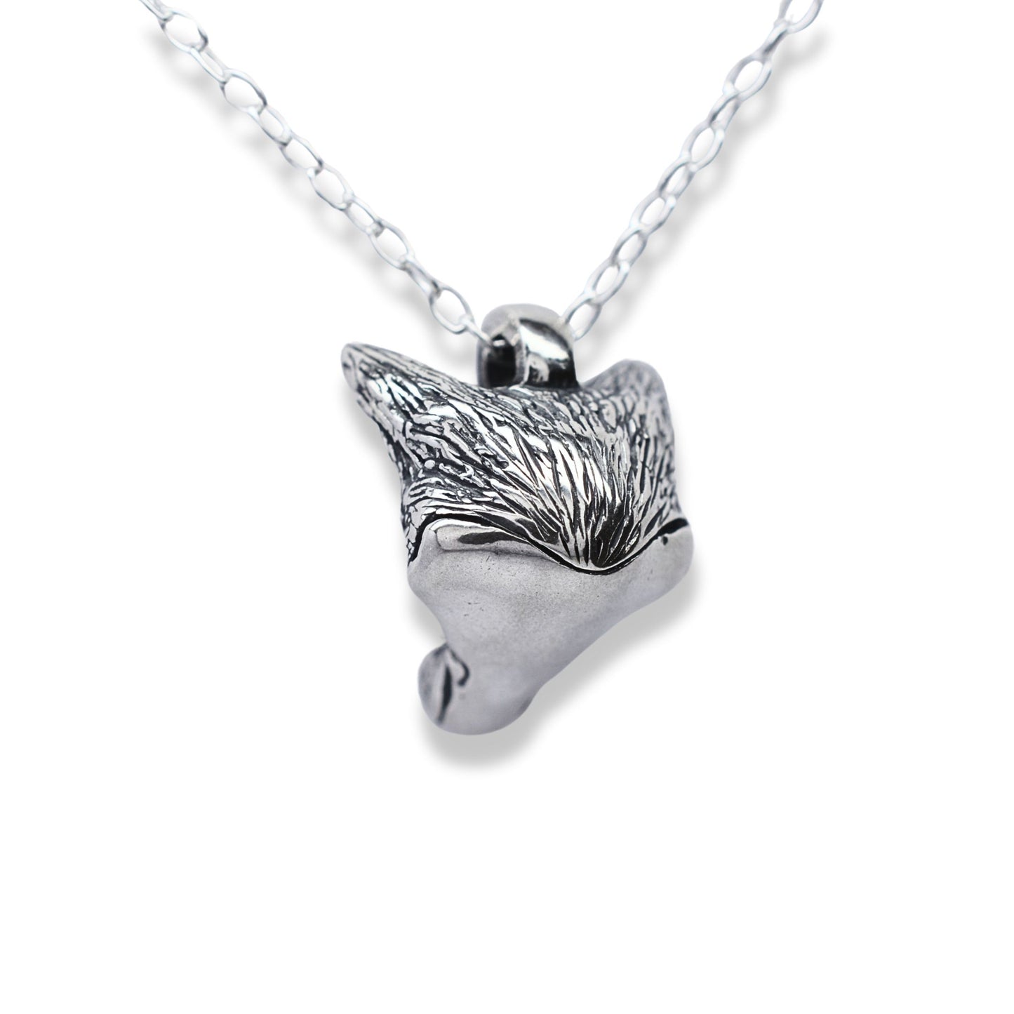 Solid sterling silver fox pendant and chain. © Adrian Ashley