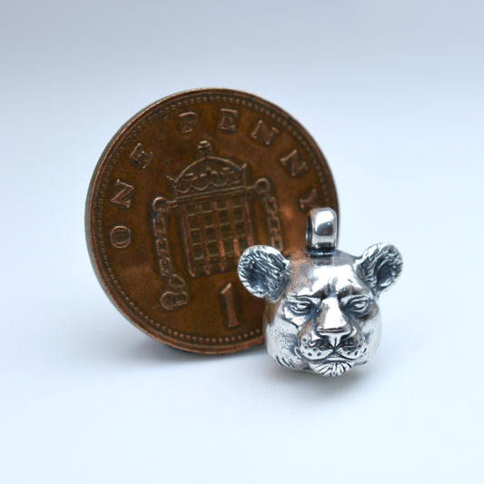 Solid sterling silver lioness pendant and chain. © Adrian Ashley