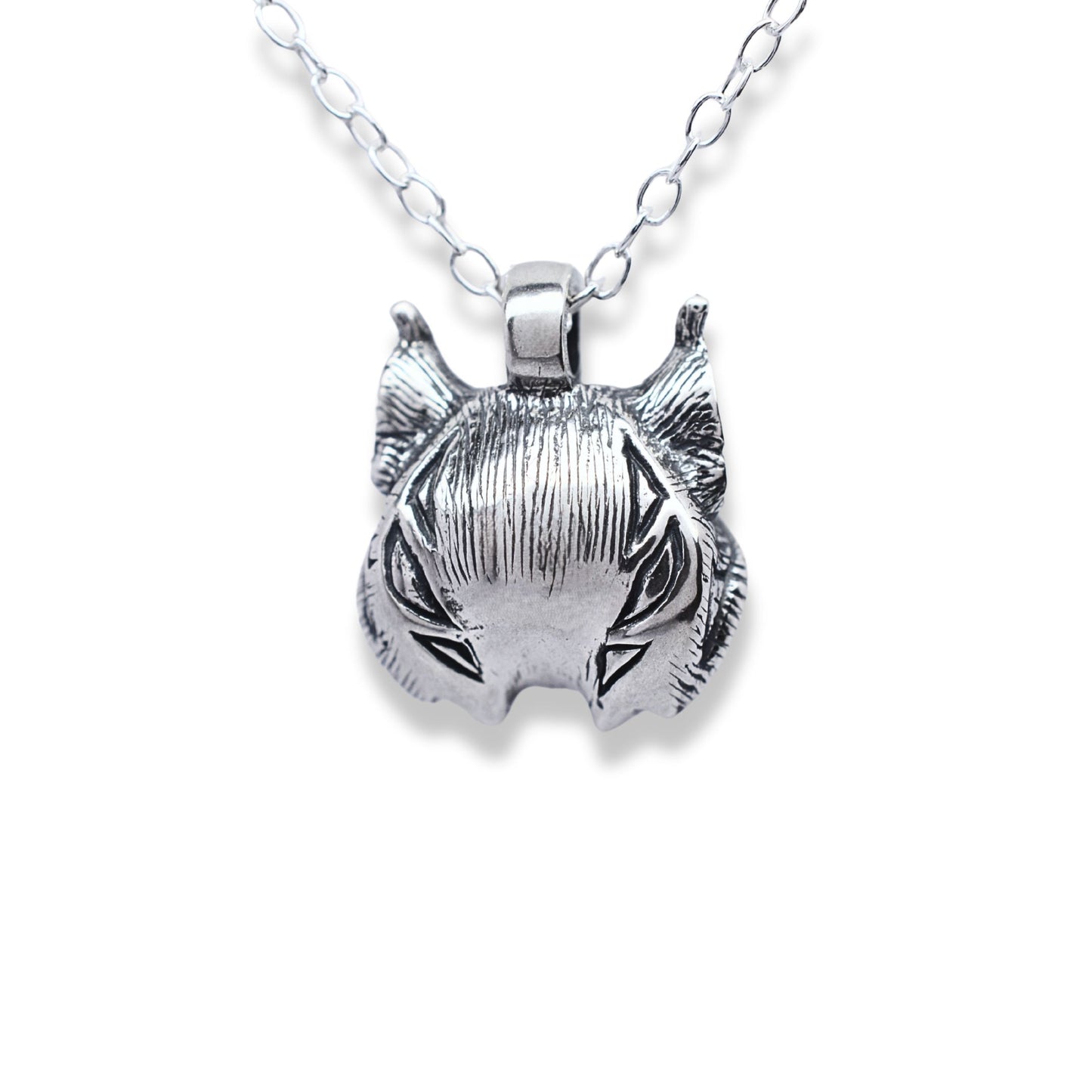 Solid sterling silver lynx pendant and chain. © Adrian Ashley