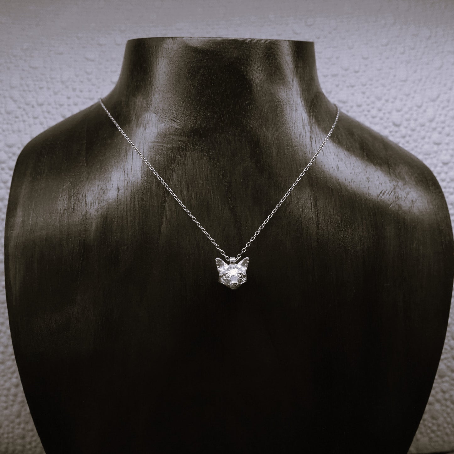 Solid sterling silver fox pendant and chain. © Adrian Ashley