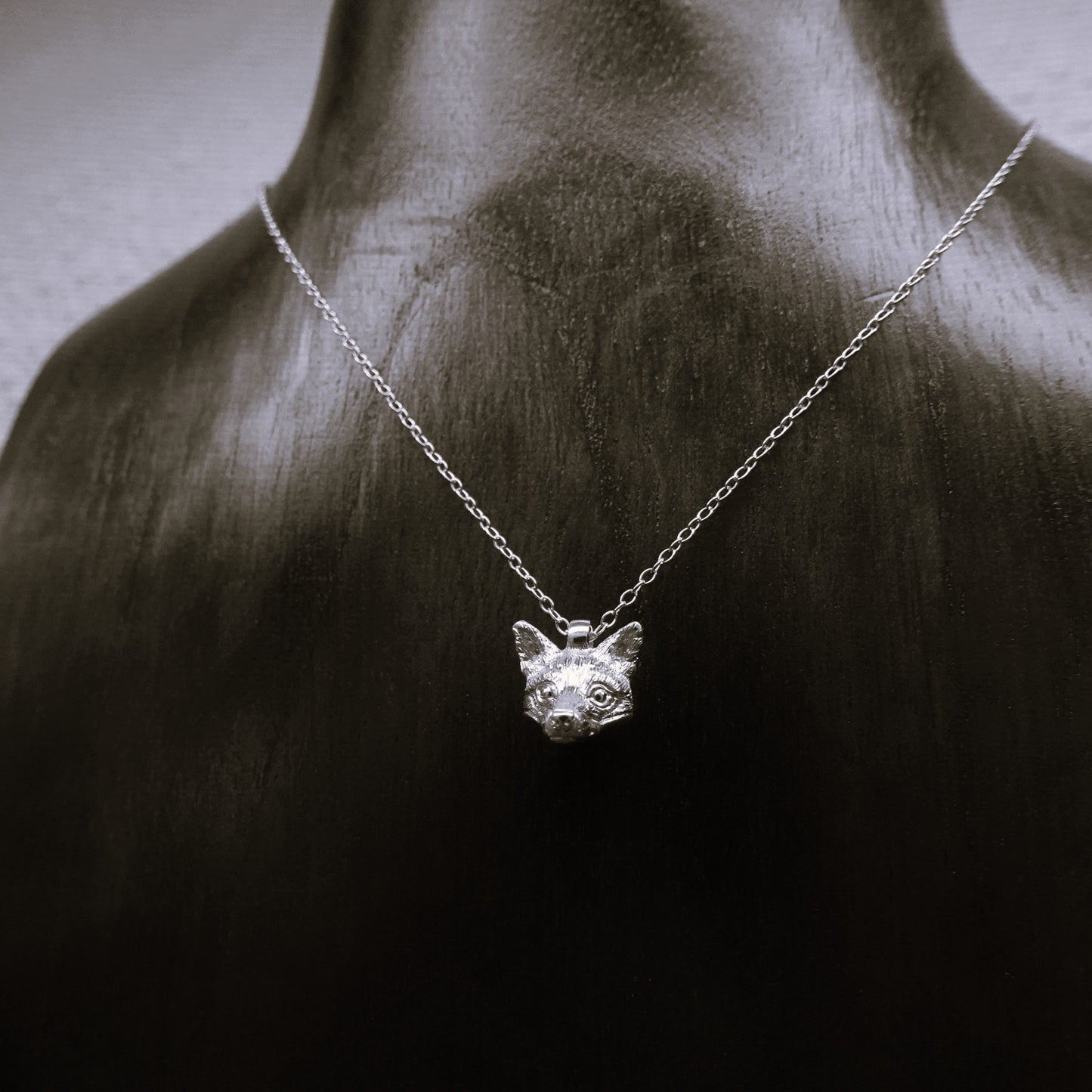 Solid sterling silver fox pendant and chain. © Adrian Ashley