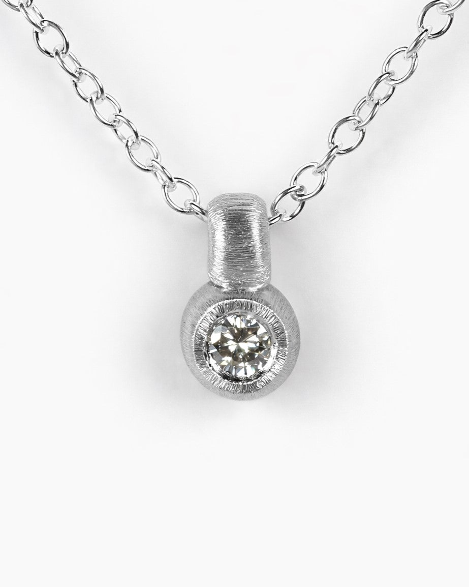 Pendant featuring a 0.13ct natural diamond reclaimed from vintage jewellery.