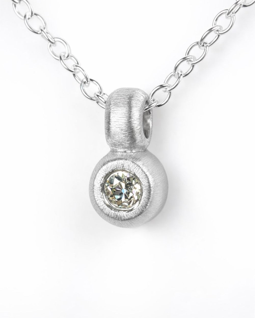 Pendant featuring a 0.13ct Old-cut diamond reclaimed from vintage jewellery.
