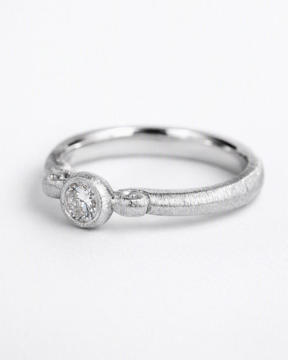 Diamond ring featuring a 0.25ct natural diamond reclaimed from vintage jewellery.