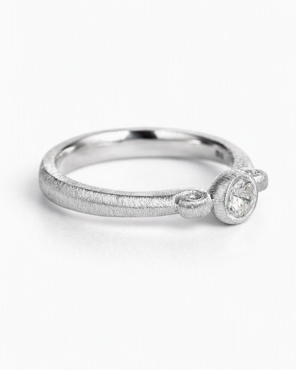 Diamond ring featuring a 0.25ct natural diamond reclaimed from vintage jewellery.