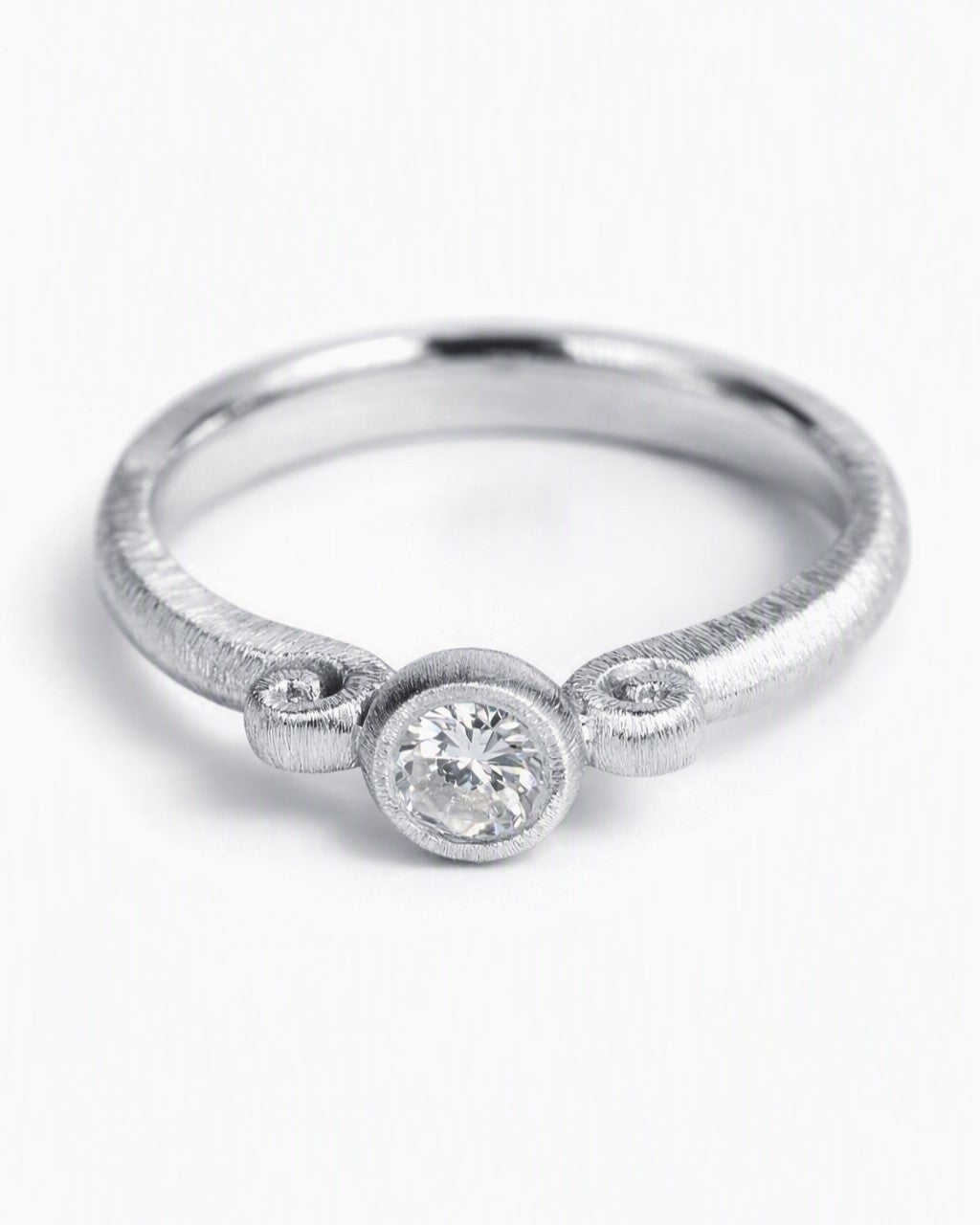 Diamond ring featuring a 0.25ct natural diamond reclaimed from vintage jewellery.