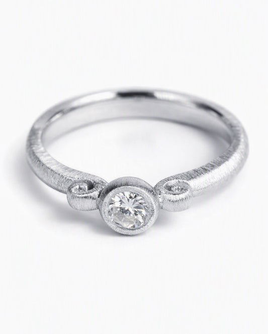 Diamond ring featuring a 0.25ct natural diamond reclaimed from vintage jewellery.