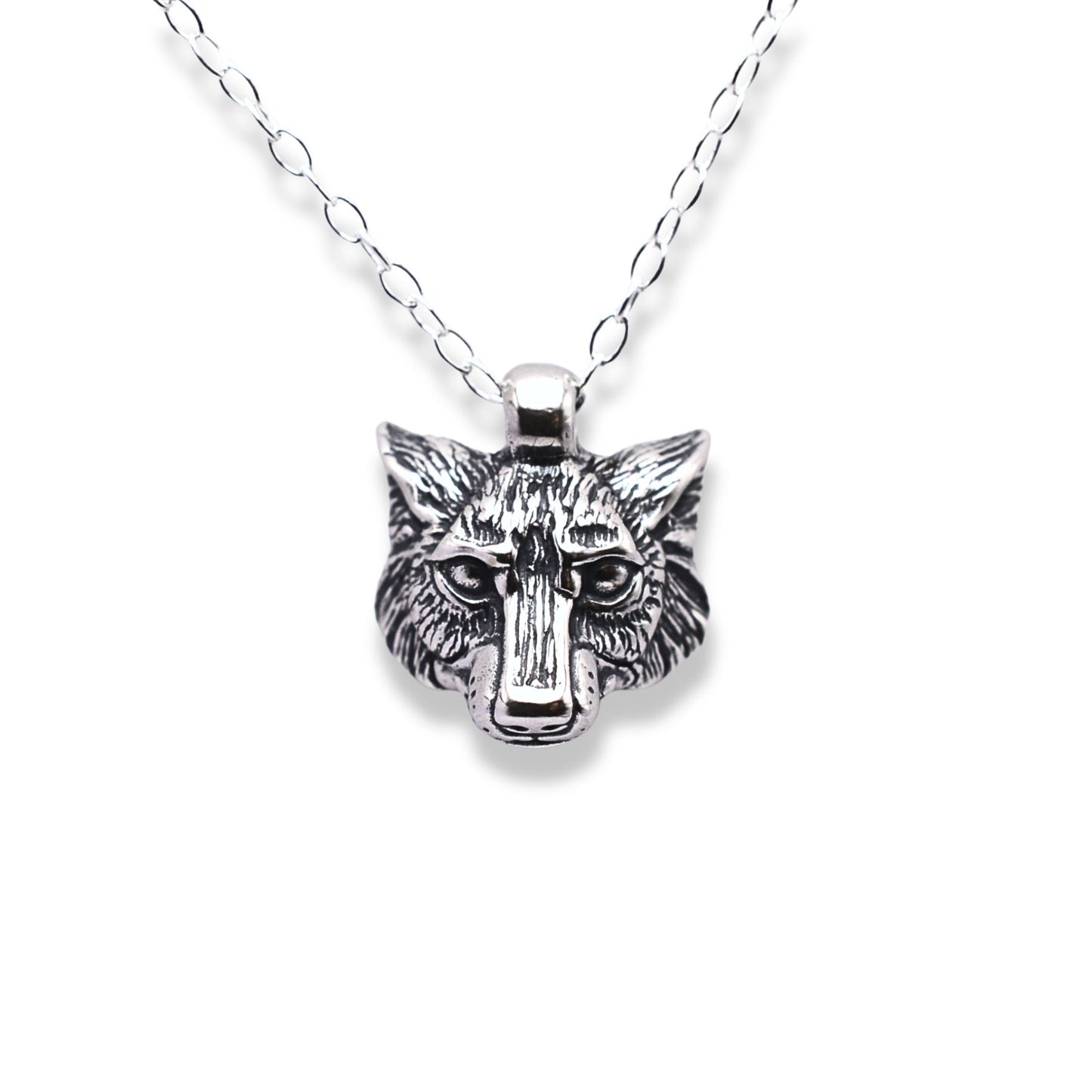 Solid sterling silver wolf pendant and chain. © Adrian Ashley