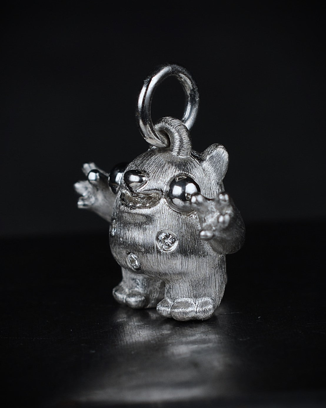 Spotty Dumpy Bright Creature set with natural diamonds.