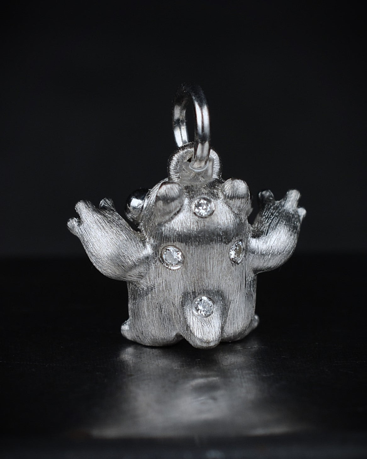Spotty Dumpy Bright Creature set with natural diamonds.