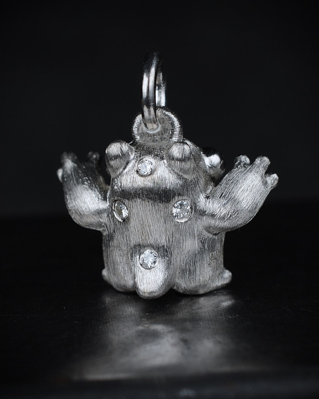 Spotty Dumpy Bright Creature set with natural diamonds.