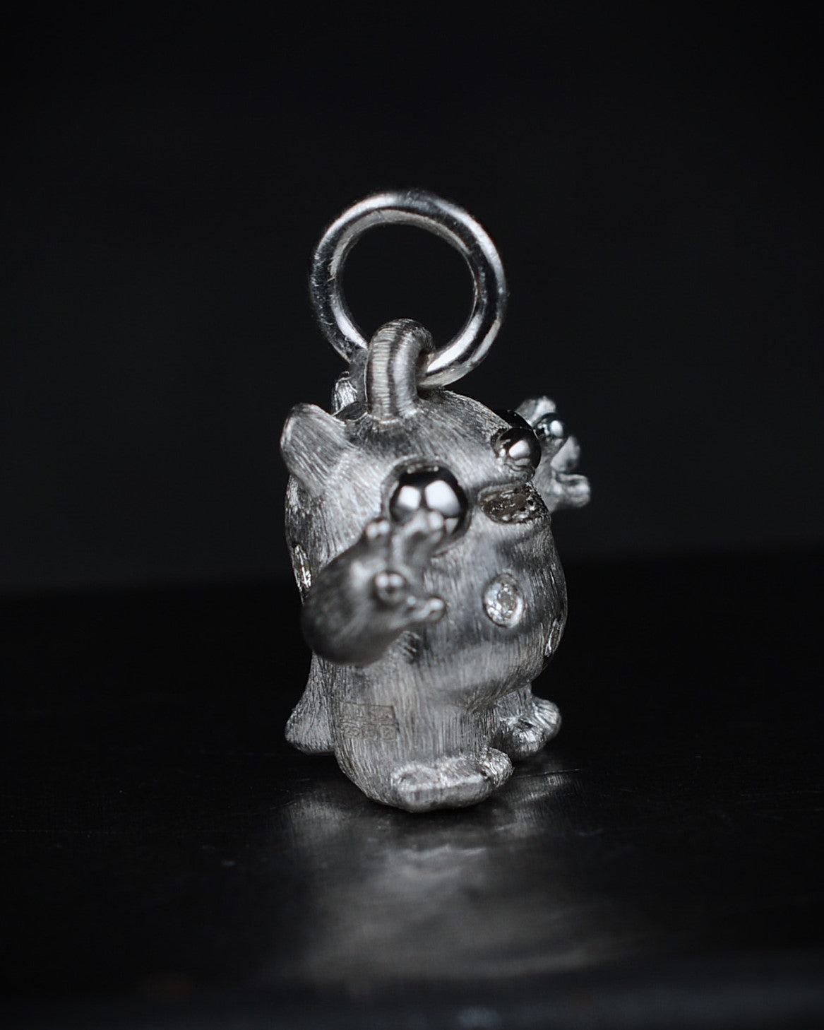 Spotty Dumpy Bright Creature set with natural diamonds.
