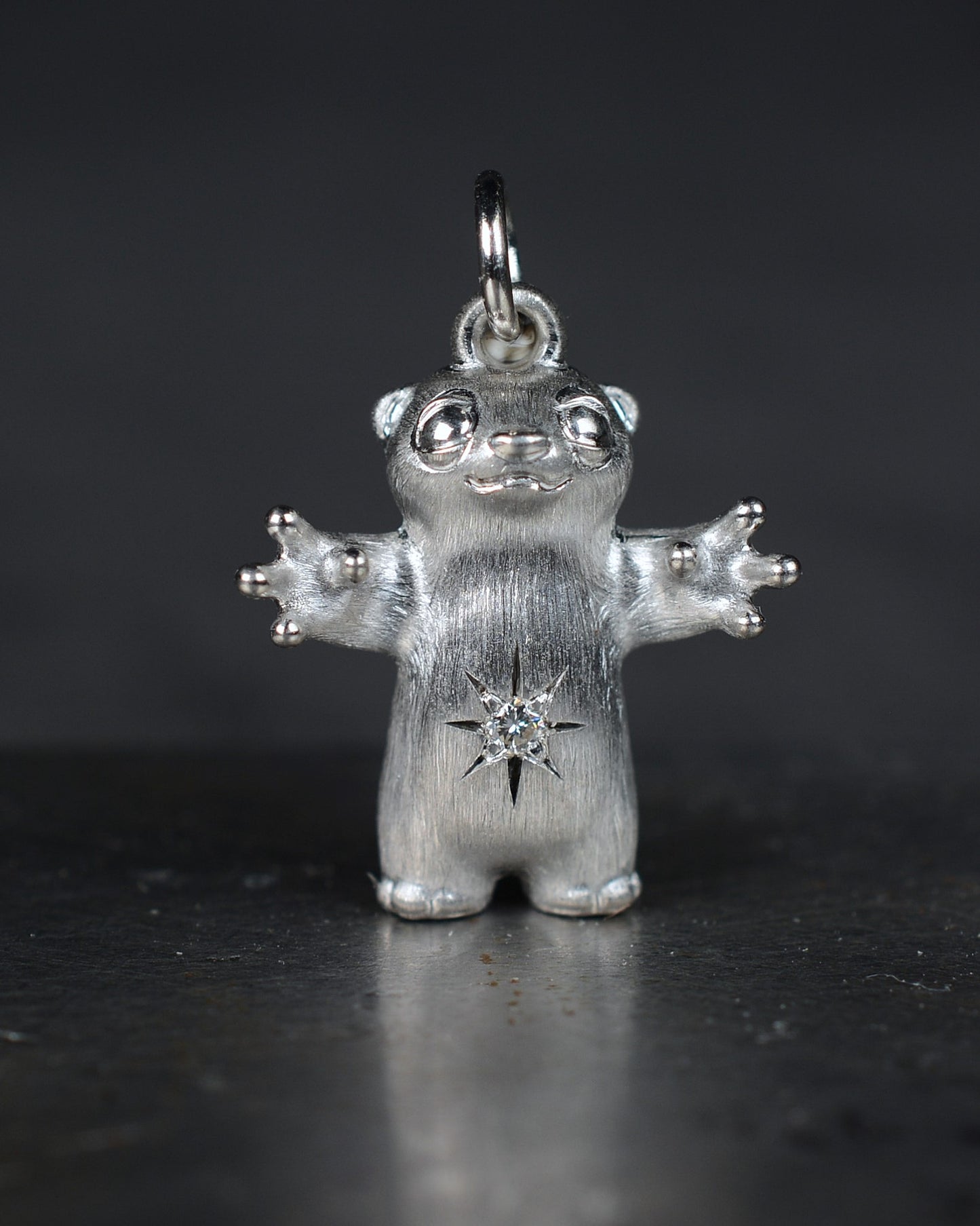 Standing stoat type Bright Creature with a star-set diamond belly.