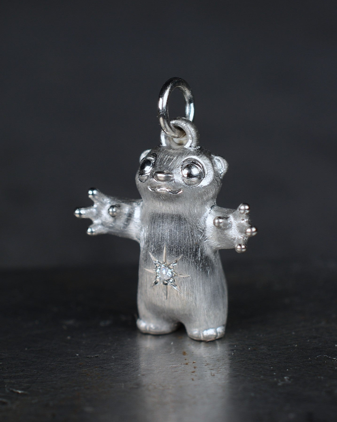 Standing stoat type Bright Creature with a star-set diamond belly.