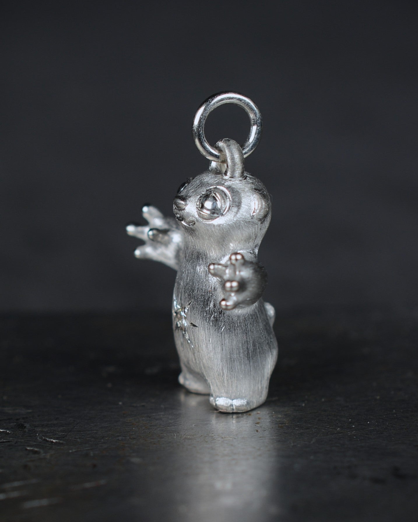 Standing stoat type Bright Creature with a star-set diamond belly.