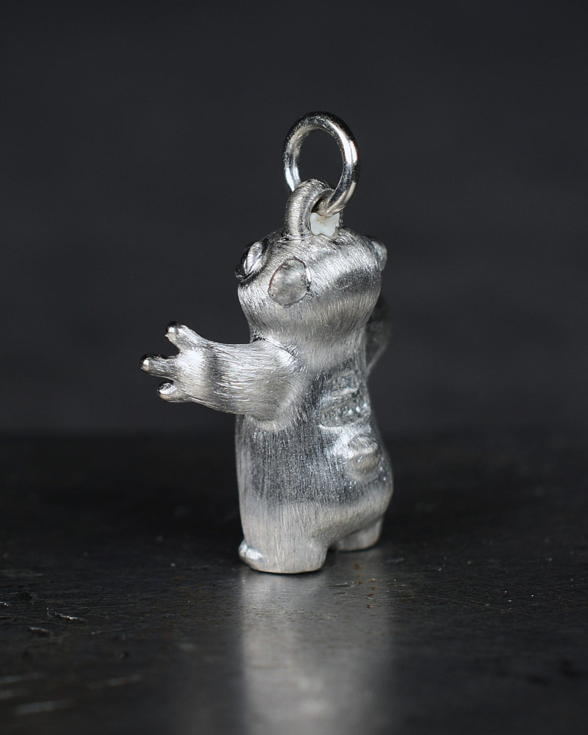Standing stoat type Bright Creature with a star-set diamond belly.