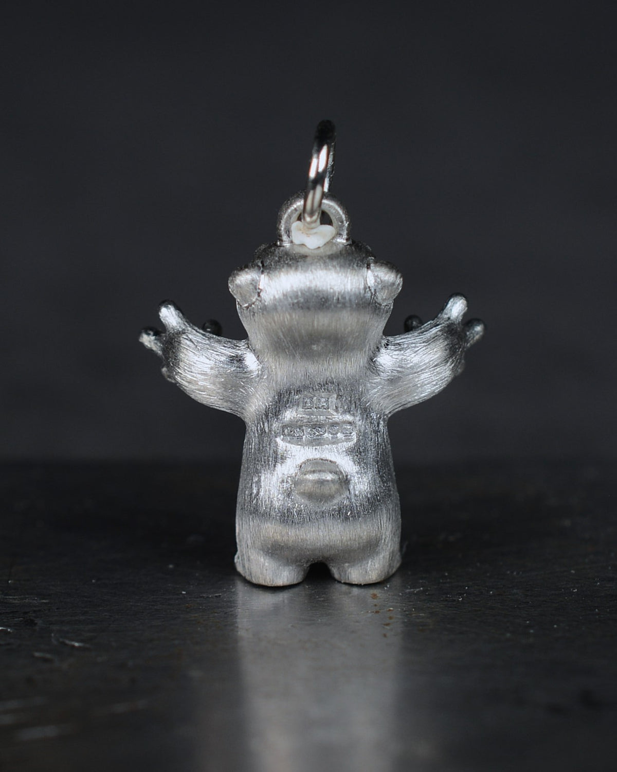 Standing stoat type Bright Creature with a star-set diamond belly.