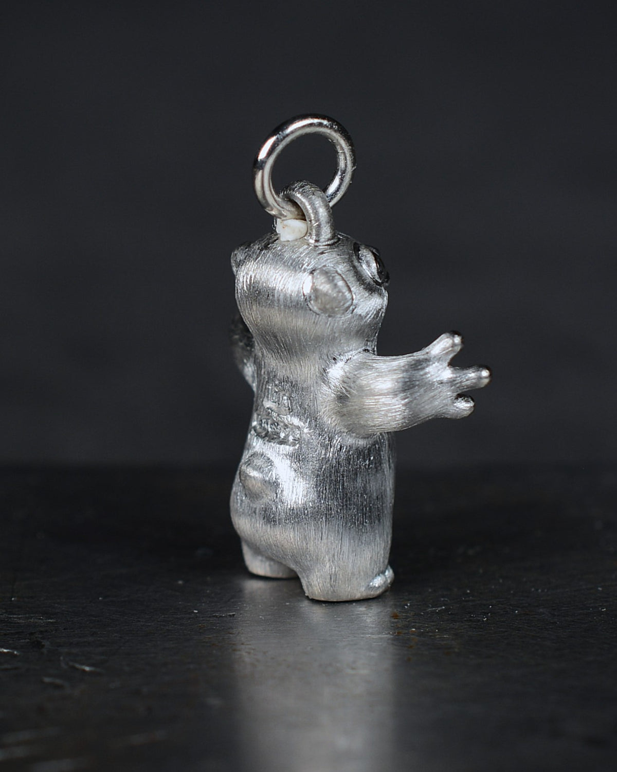 Standing stoat type Bright Creature with a star-set diamond belly.