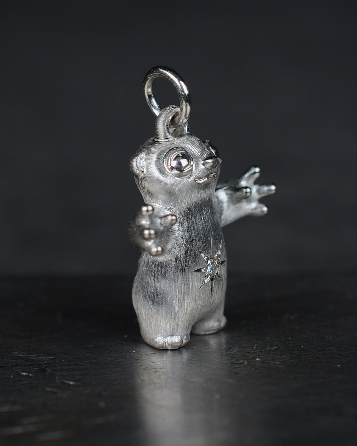 Standing stoat type Bright Creature with a star-set diamond belly.