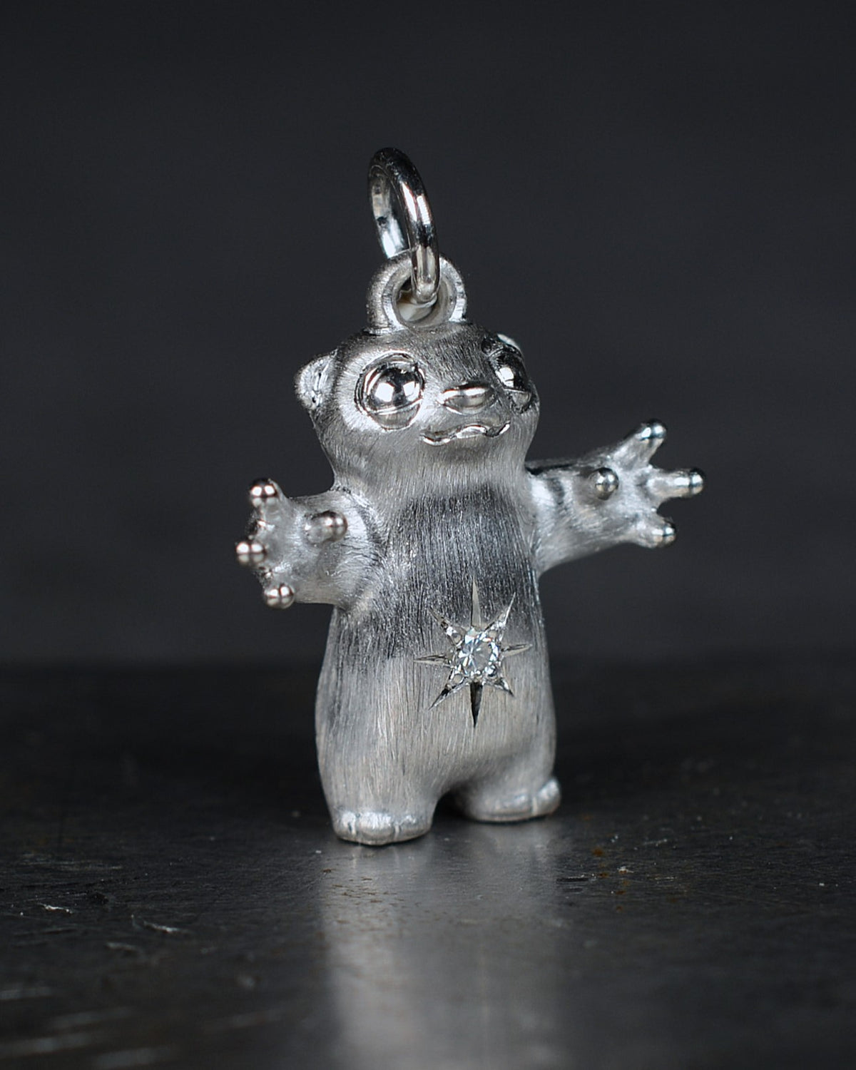 Standing stoat type Bright Creature with a star-set diamond belly.