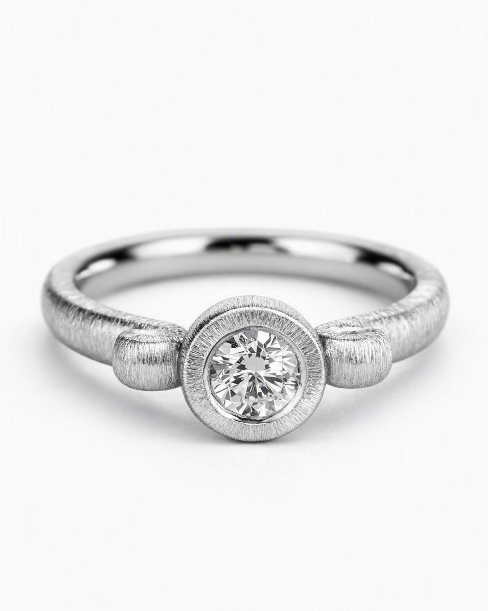 Diamond ring featuring a 0.33ct natural diamond reclaimed from vintage jewellery.