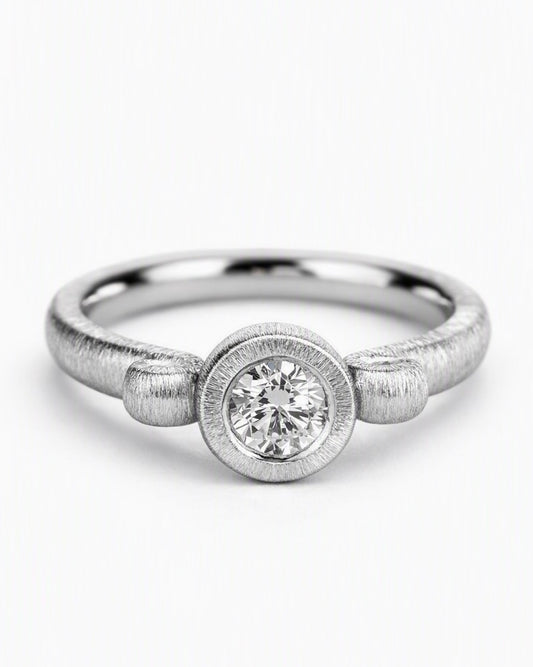 Diamond ring featuring a 0.33ct natural diamond reclaimed from vintage jewellery.