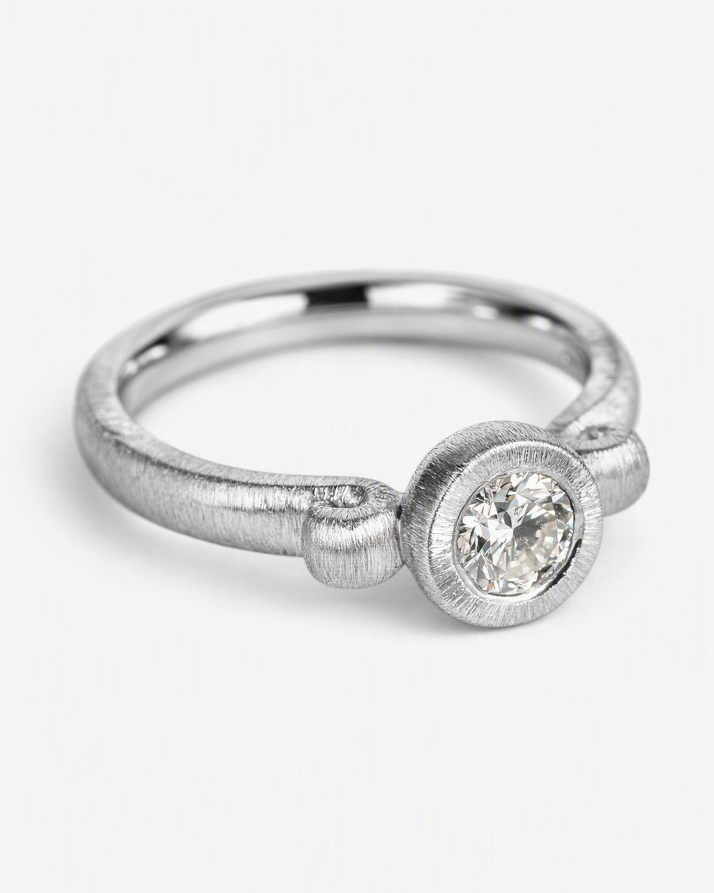 Diamond ring featuring a 0.33ct natural diamond reclaimed from vintage jewellery.