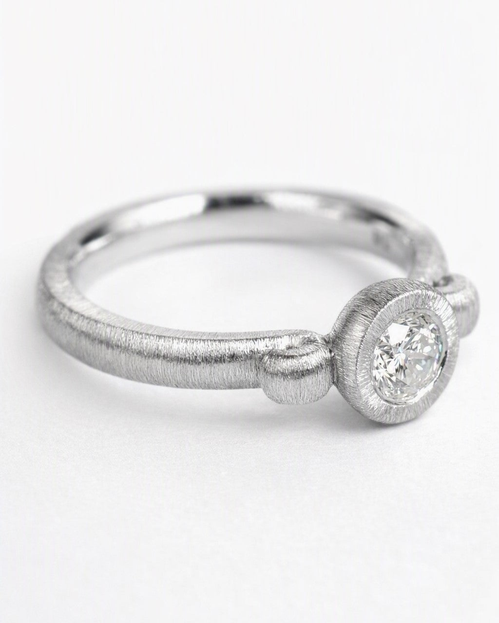 Diamond ring featuring a 0.33ct natural diamond reclaimed from vintage jewellery.