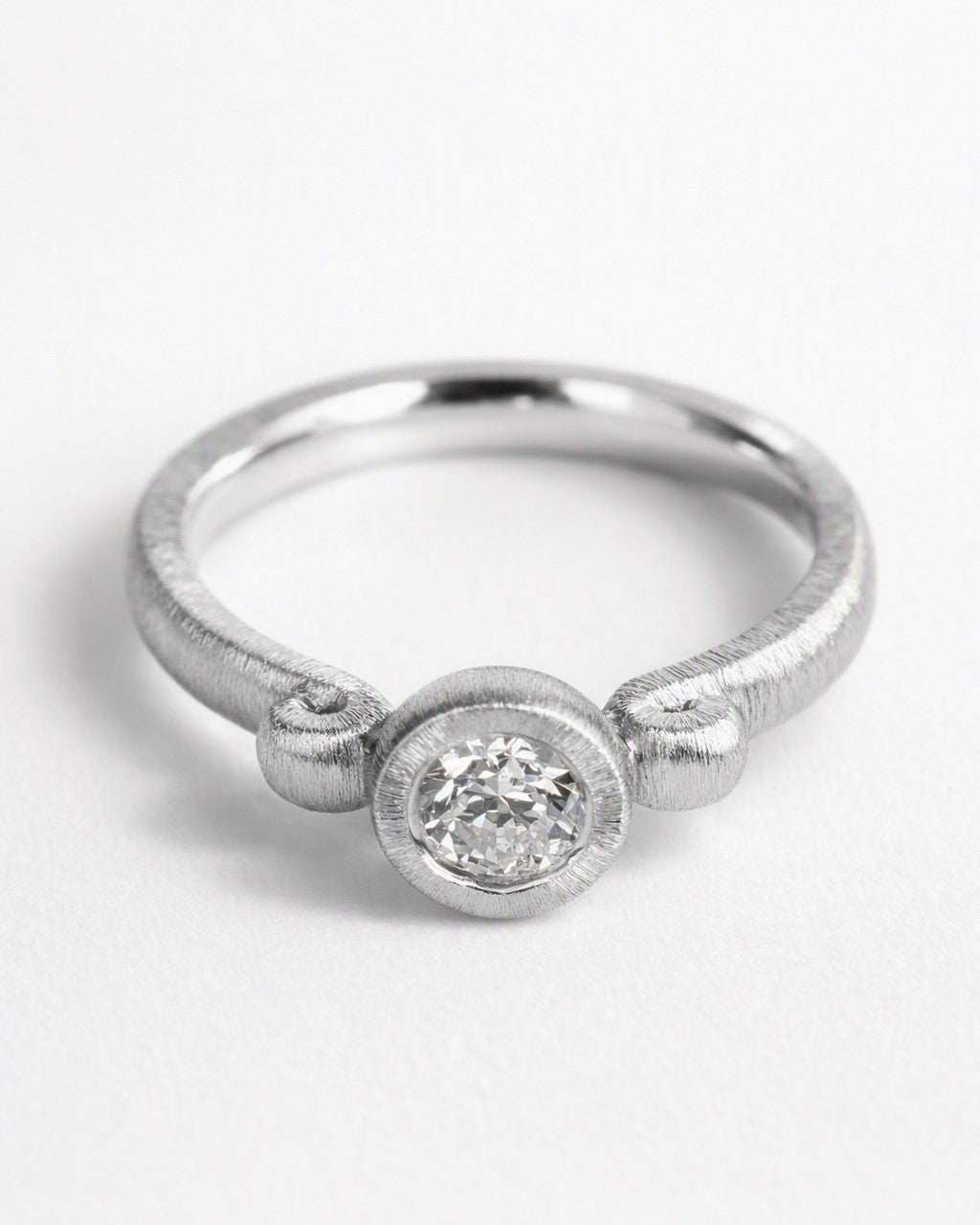 Diamond ring featuring a 0.33ct natural diamond reclaimed from vintage jewellery.