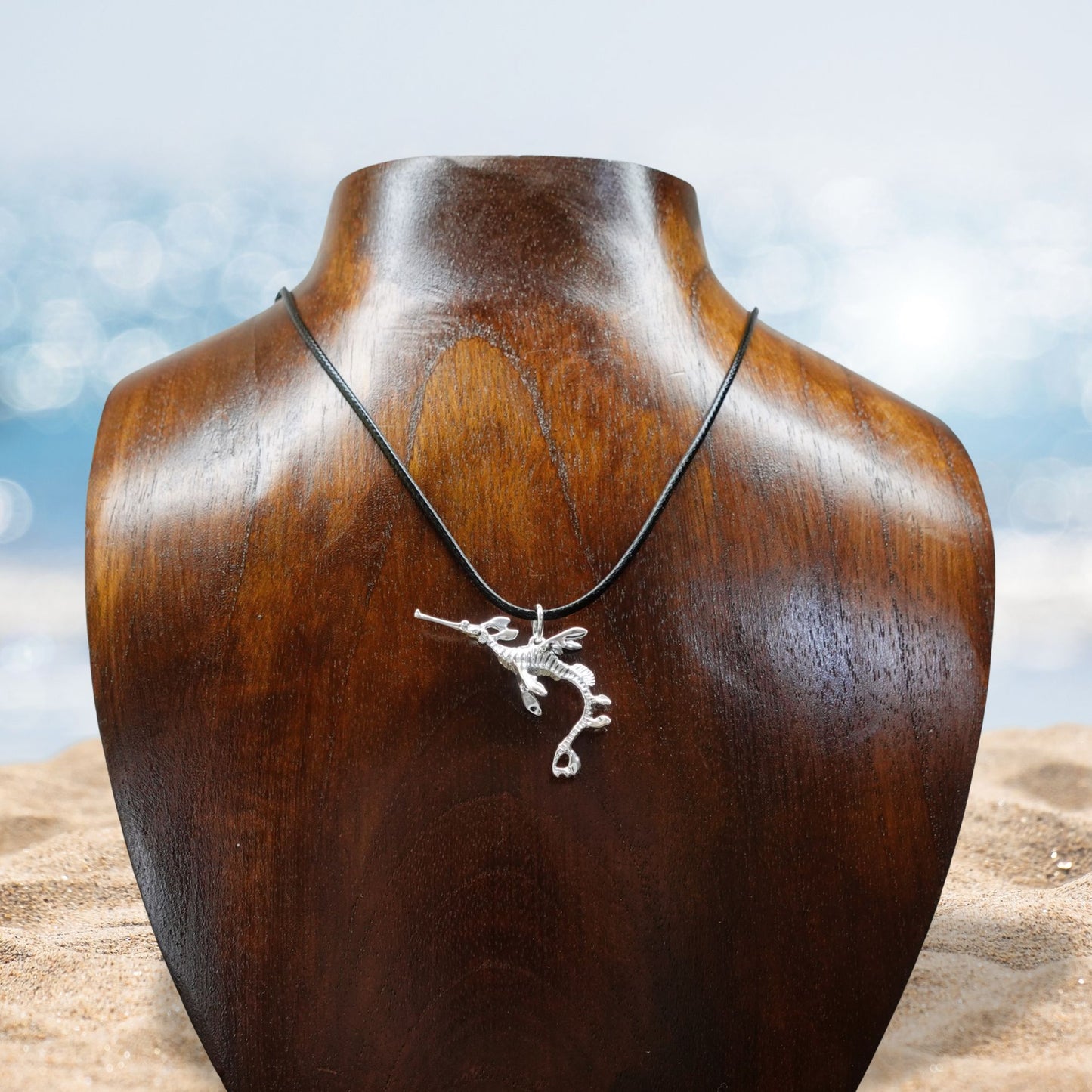 Weedy Sea Dragon necklace. Made from highly polished, tarnish resistant silver, strung on a strong cord. © Adrian Ashley