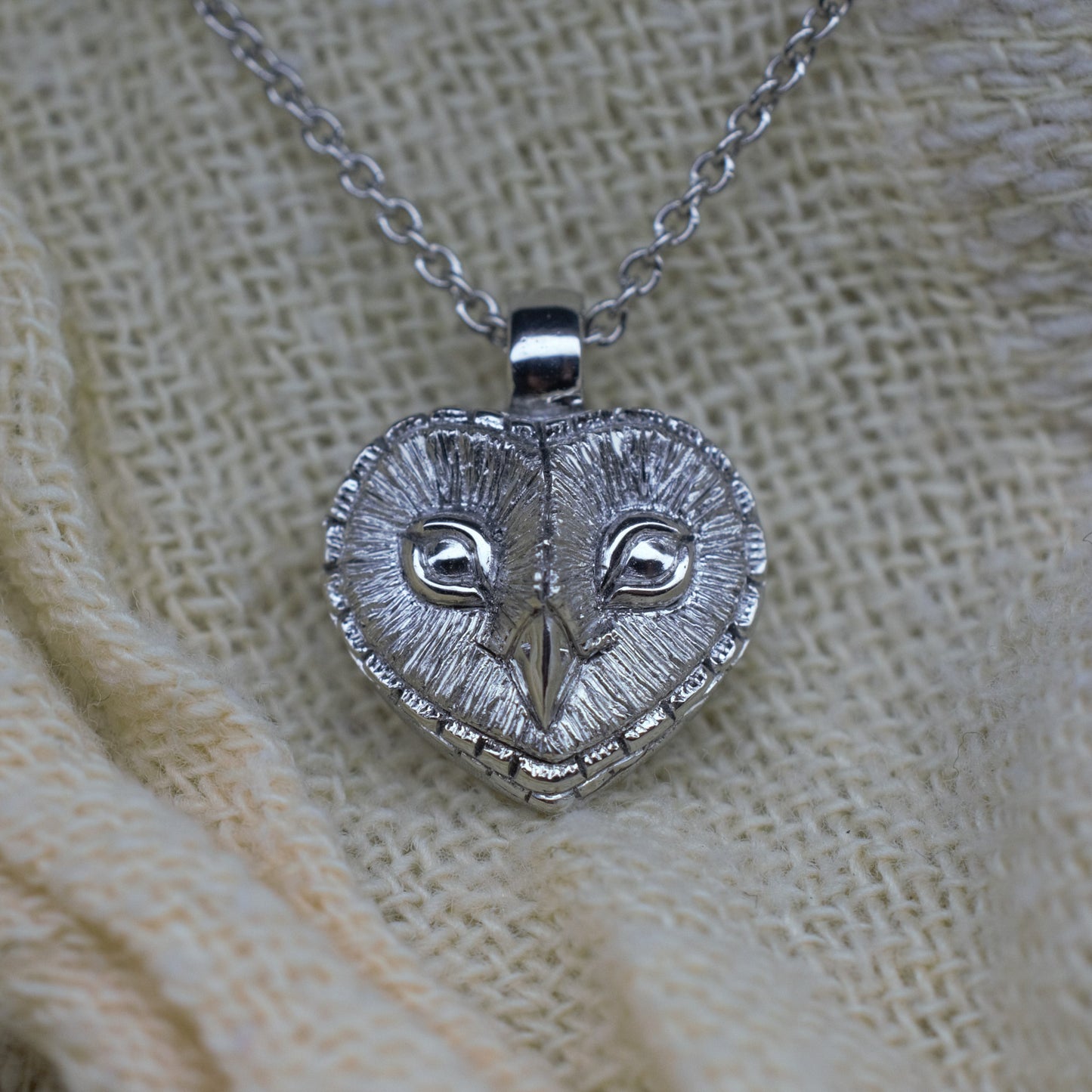 Platinum Owl charm with a solid platinum chain. Hand made to order. © Adrian Ashley