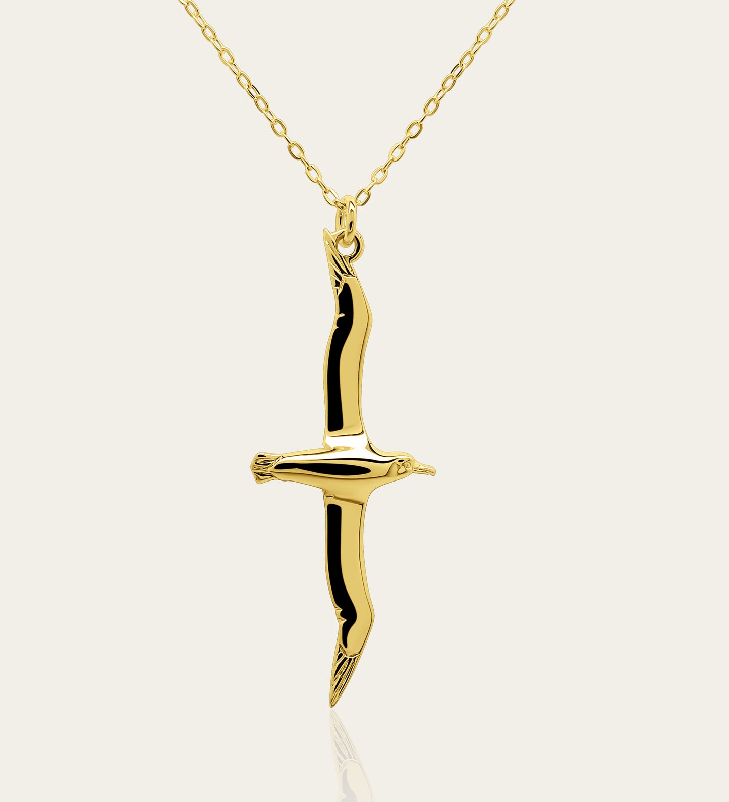 Gold plated silver Albatross pendant and chain. © Adrian Ashley