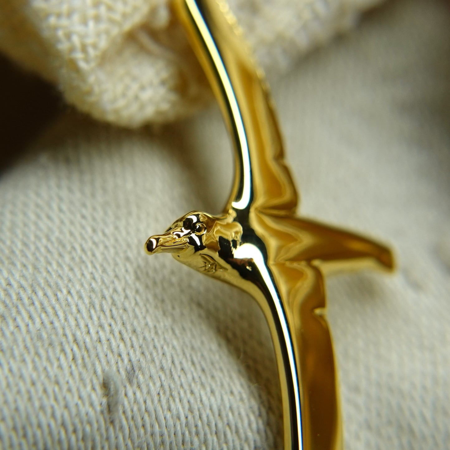 Gold plated silver Albatross pendant and chain. © Adrian Ashley