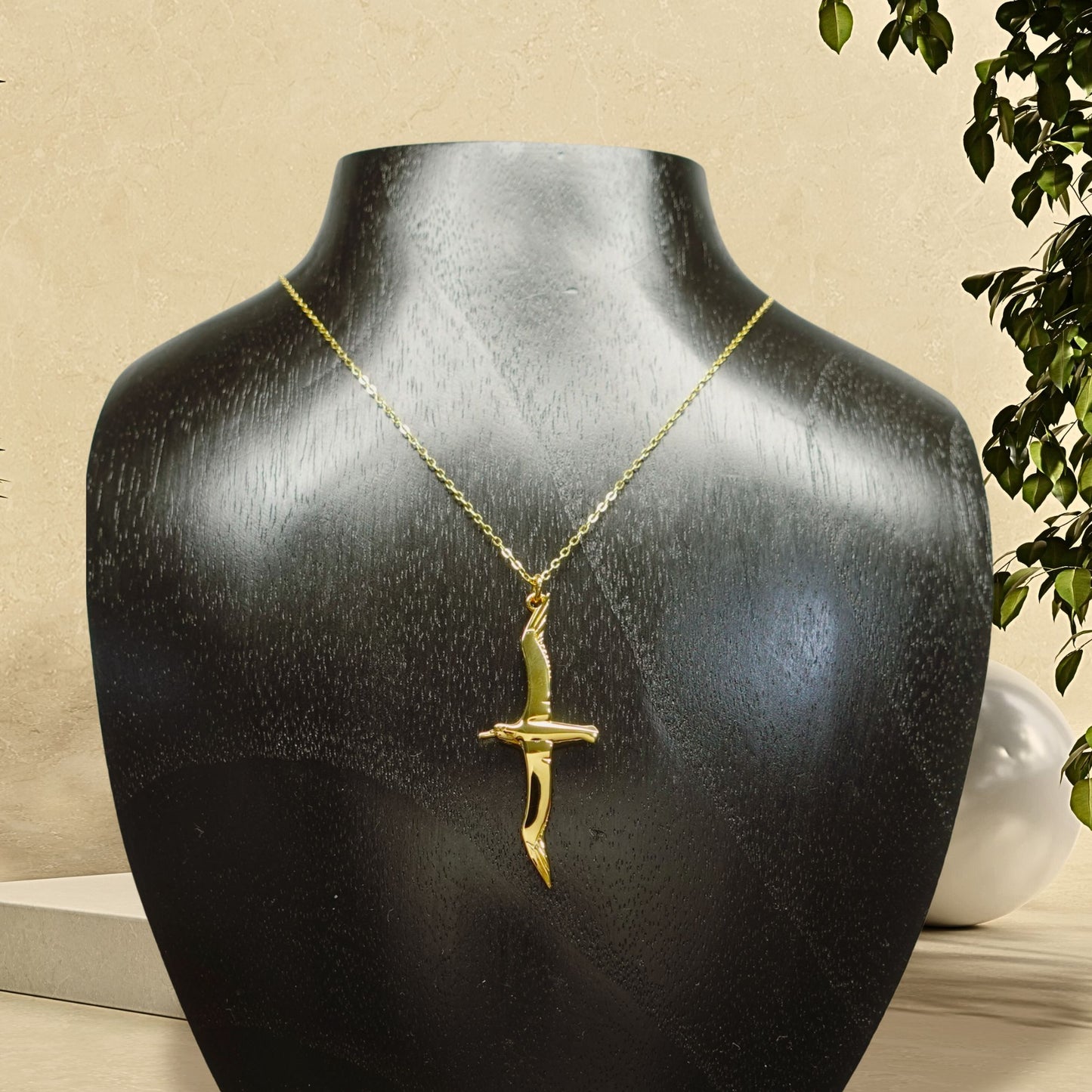 Gold plated silver Albatross pendant and chain. © Adrian Ashley