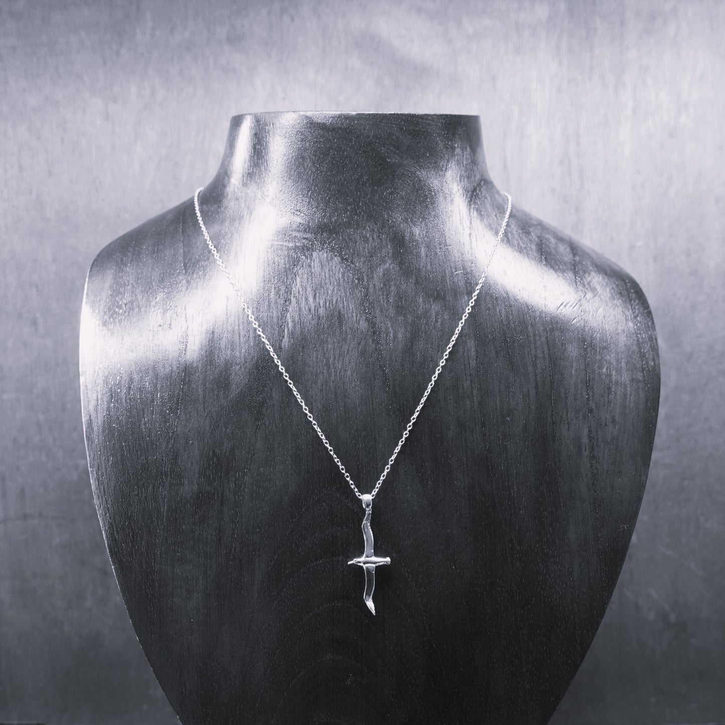 Platinum Albatross charm with a solid platinum chain. Made to order. © Adrian Ashley