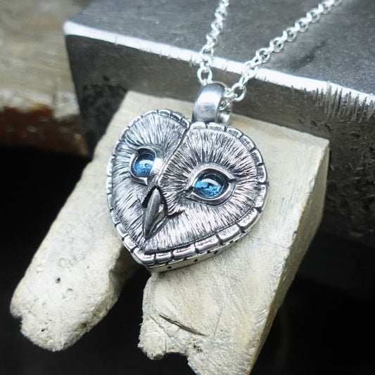 Blue eyed Barn Owl necklace, large sterling silver Barn Owl pendant with blue topaz eyes and a silver chain.  *This piece is finished and ready to be shipped* © Adrian Ashley