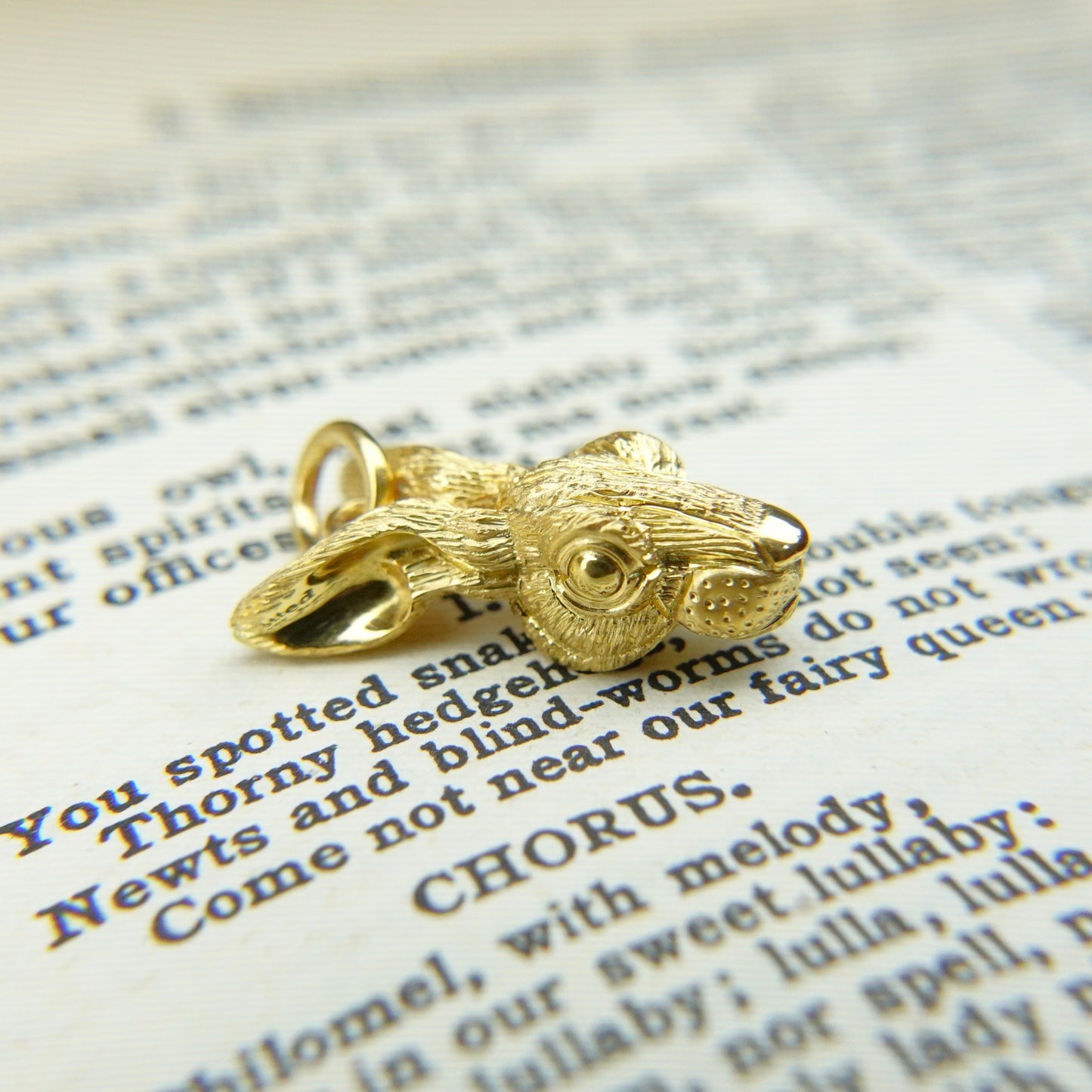 Solid 22ct gold hare pendant and platinum chain. Handmade to order. © Adrian Ashley