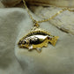 Gold plated silver Mirror Carp pendant and chain. © Adrian Ashley